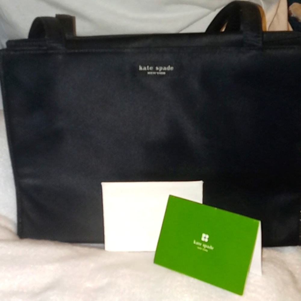 Kate Spade black satin purse. Gently used